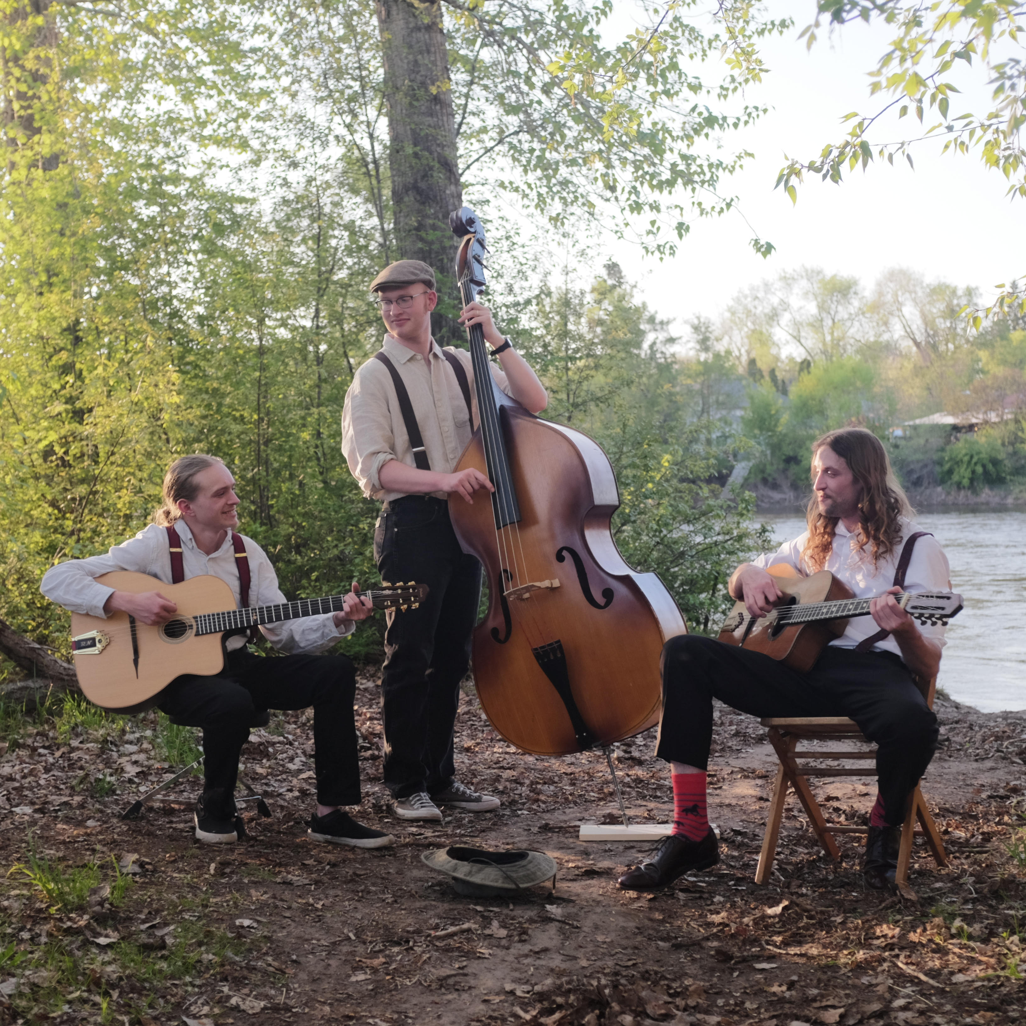 Cool band photo of three young men dressed all European-like